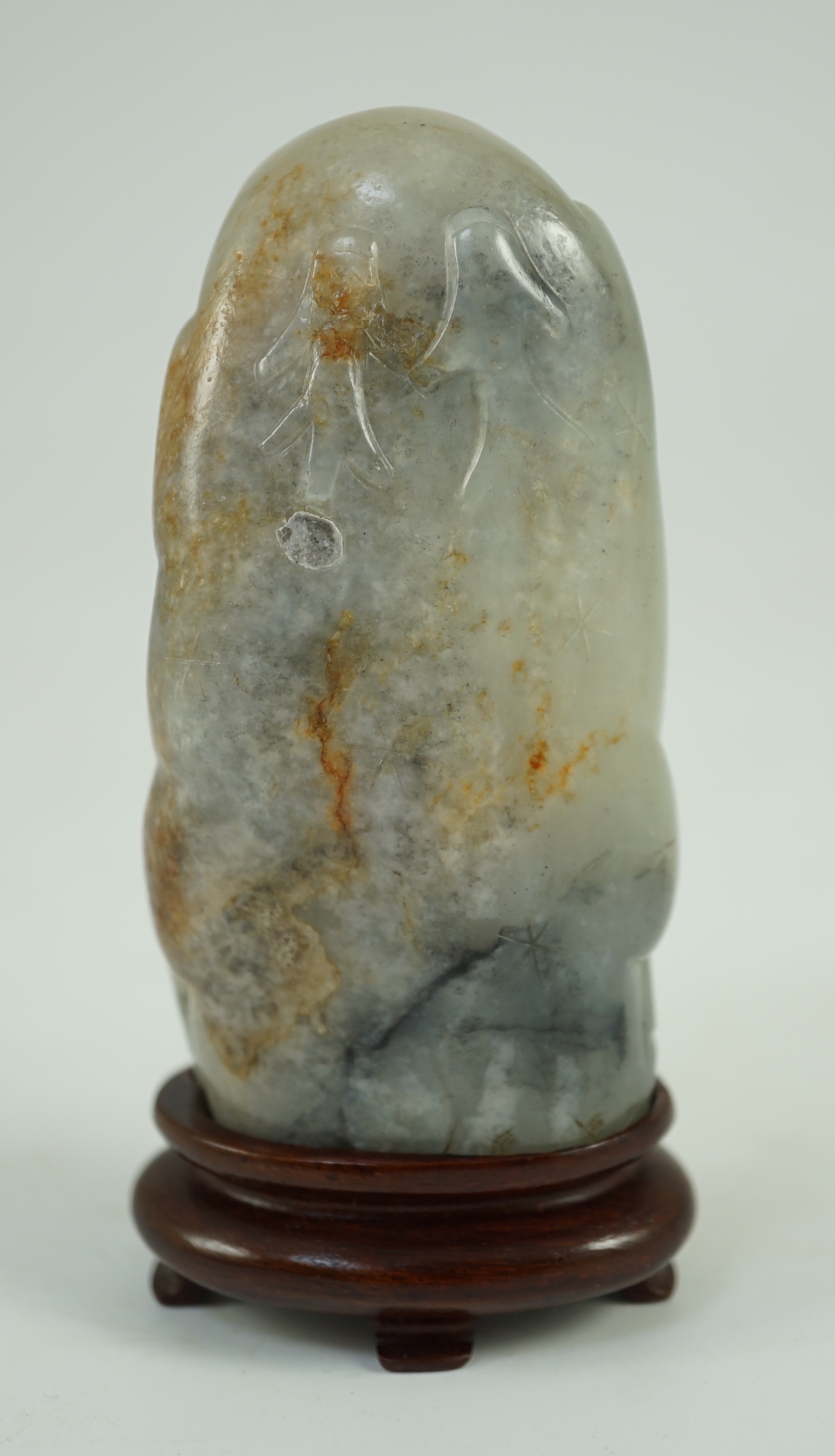 A Chinese white, grey and russet jade figure of Zhou Yanzi, Ming dynasty, 8.5cm high, Filled hole to figure, wood stand